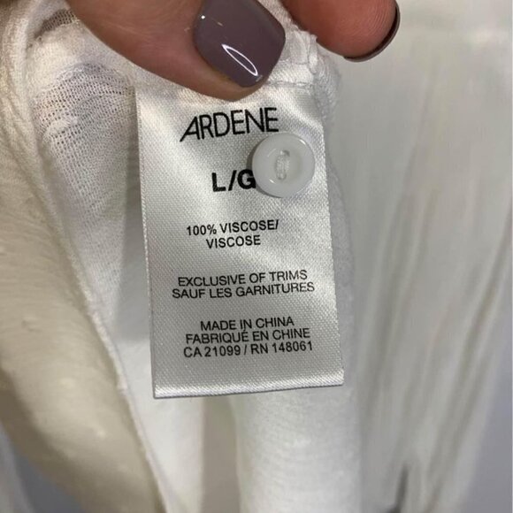 Woman’s white swing top. Long sleeve. White. Size large. Sheer detail. New condi - Picture 9 of 10